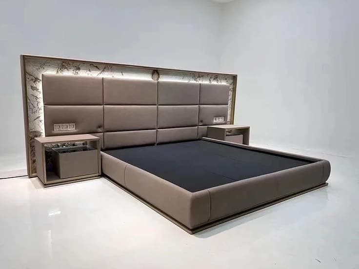 Grey platform bed and side tables