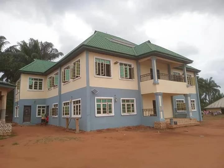 Soft stone-green family home