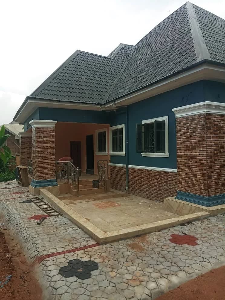 Brick and deep-green bungalow