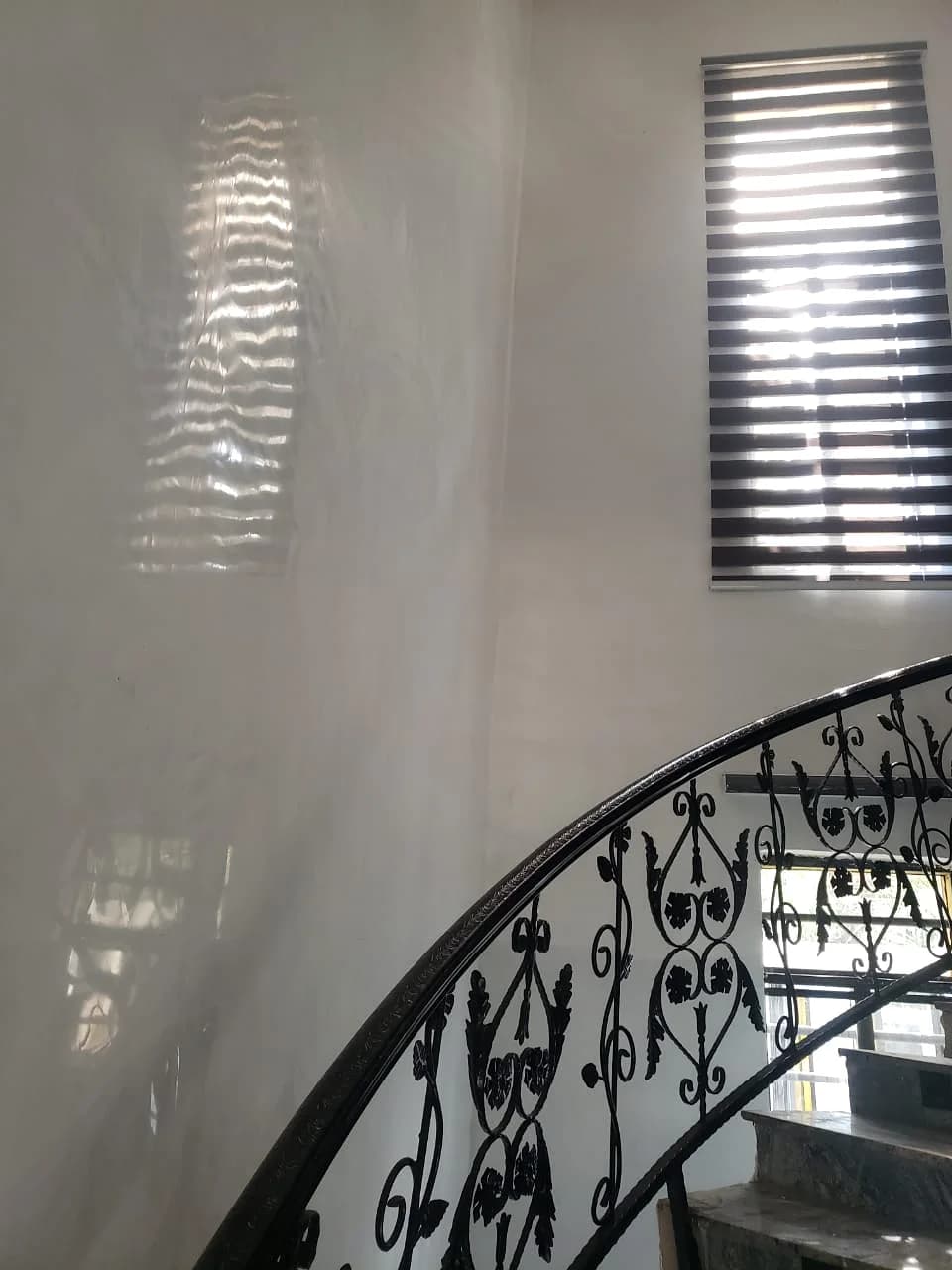 Reflective stair-hall finish