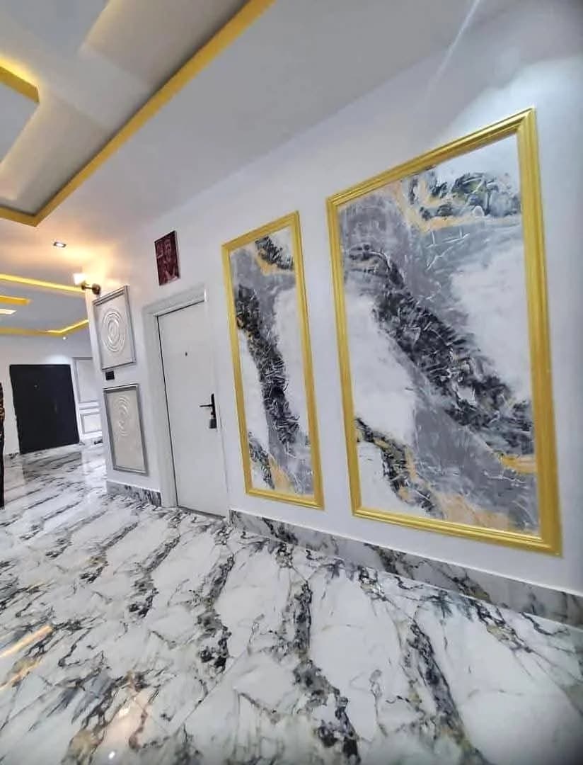 Gold-framed art wall
