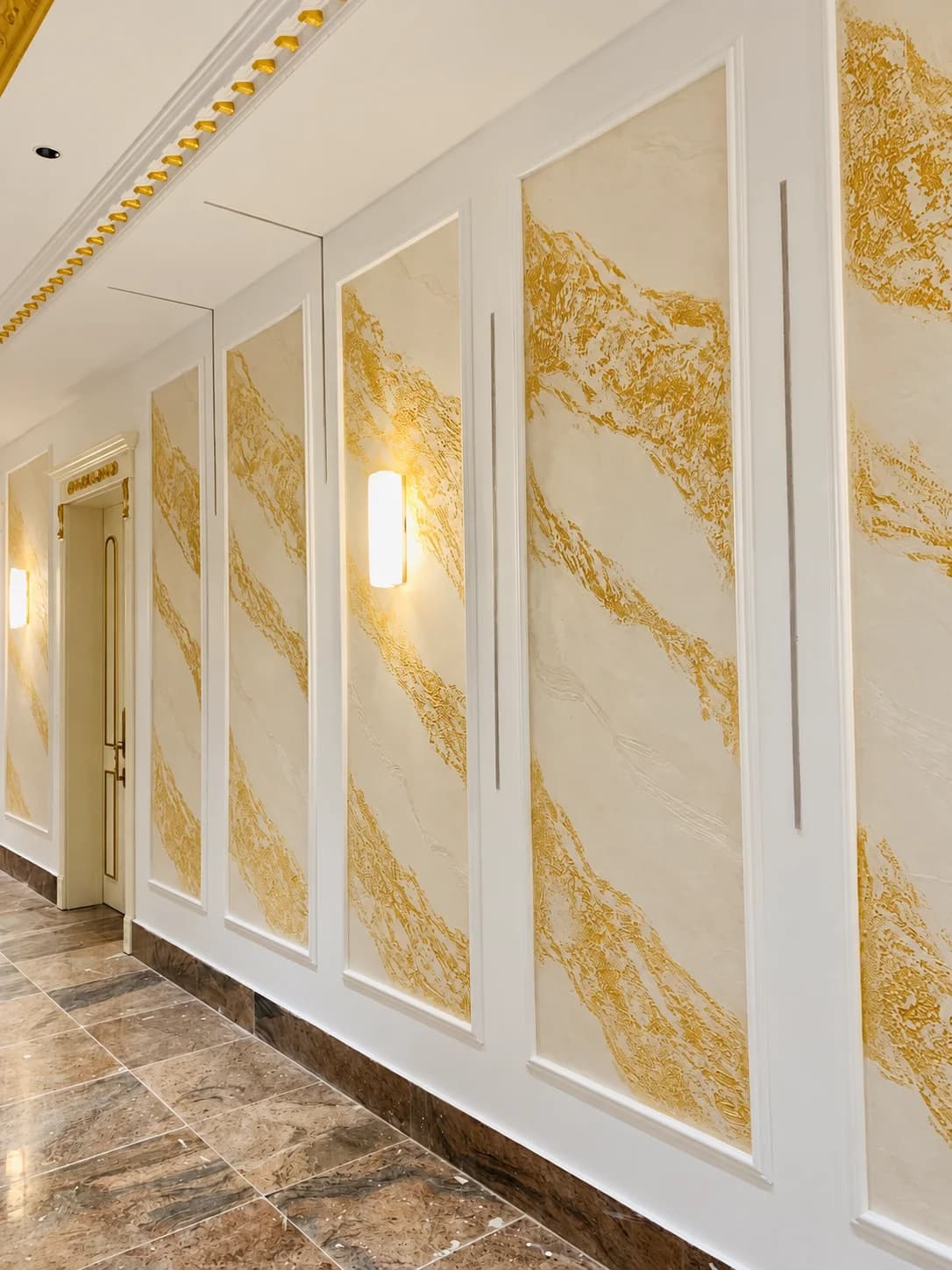 Cream and gold panelled corridor